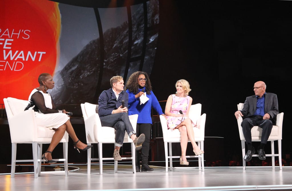 Oprah Winfrey on stage with tour “trailblazers" (from left) Iyanla Vanzant, Pastor Rob Bell, Elizabeth Gilbert and Mark Nepo at the Verizon Center in Washington, D.C. on Saturday, September 20, 2014.  This was the third stop of Winfrey’s eight-city arena tour, “Oprah’s The Life You Want Weekend,” traveling throughout the U.S. this fall. Courtesy of Harpo Studios, Inc. / George Burns