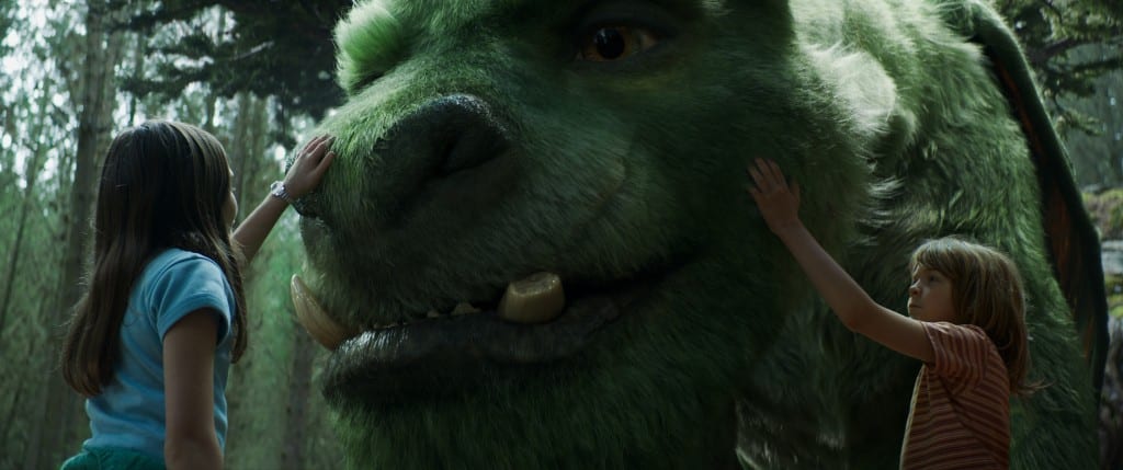 Oakes Fegley is Pete and Oona Laurence is Natalie in Disney's PETE'S DRAGON, the story of a boy named Pete and his best friend Elliot, who just happens to be a dragon. Photo credit: Disney