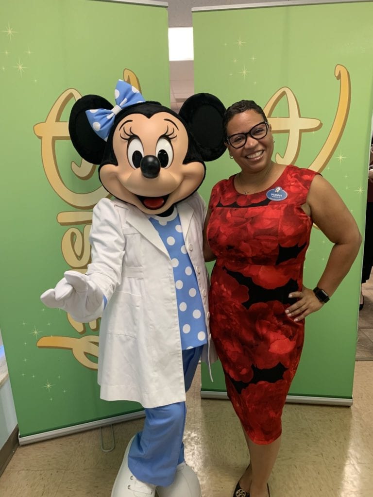 D'Anna Craighead techology manager with Minnie Mouse at Disney